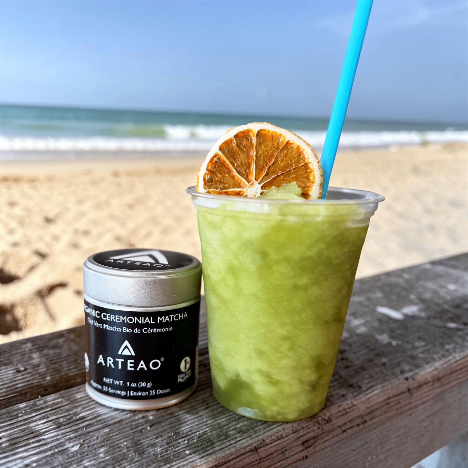 Iced ceremonial matcha by the beach